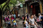 Chiến tranh thương mại nổ ra, người TQ giằng xé trước "giấc mơ Mỹ"