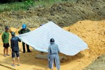 Phát hiện thi thể thanh niên bị vùi trong thùng xe tải chở đất
