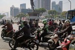 Grab đối đầu Gojek trong cuộc chiến giao đồ ăn tỷ USD