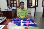 Bắt xe khách lên Điện Biên mua 1 bánh heroin và 14.000 viên ma túy