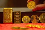 Giá vàng thế giới giảm khi chứng khoán Mỹ cao kỷ lục