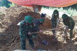 Phát hiện hài cốt liệt sĩ nghi là nữ quân nhân, an táng trong thùng đạn
